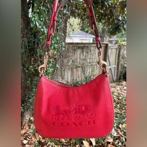 Coach  Red Shoulder hobo Bag wt horse & carriage logo .